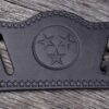 A black leather wallet with the tennessee state symbol on it.