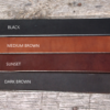 A group of four different colors of leather.