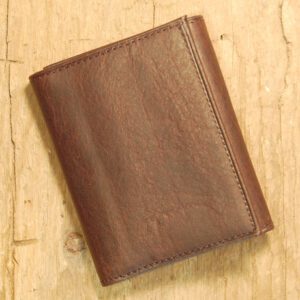 A brown wallet sitting on top of a wooden table.